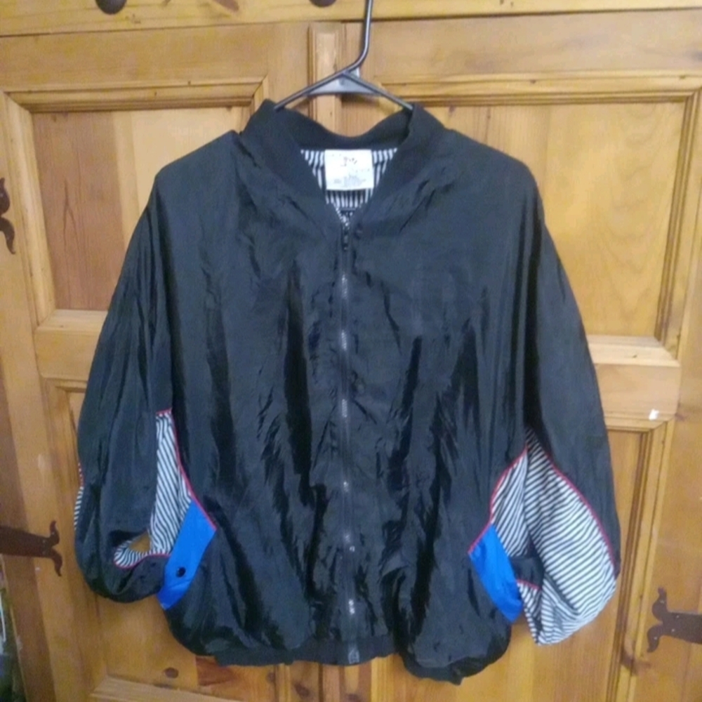 Stylish Black Windbreaker with Blue and Red Accents
